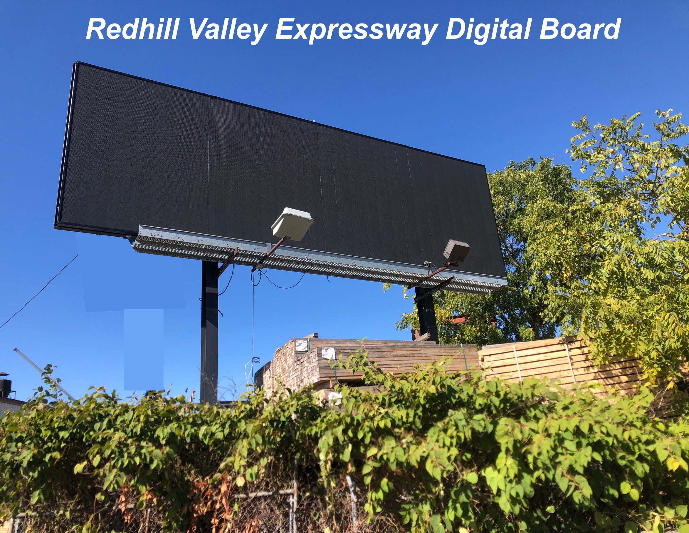 Large outdoor LED digital billboard installed on Redhill Valley Expressway Hamilton Ontario by Dover Digital Signs